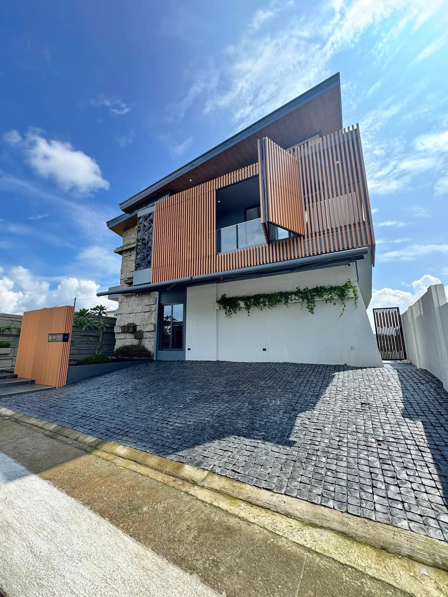 A Brand New Modern Tropical Resort-inspired Home set in the prestigious West End of Sun Valley Estates, Antipolo City.